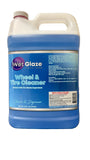 Blue and white container of Wet Glaze Wheel & Tire Cleaner on a countertop.